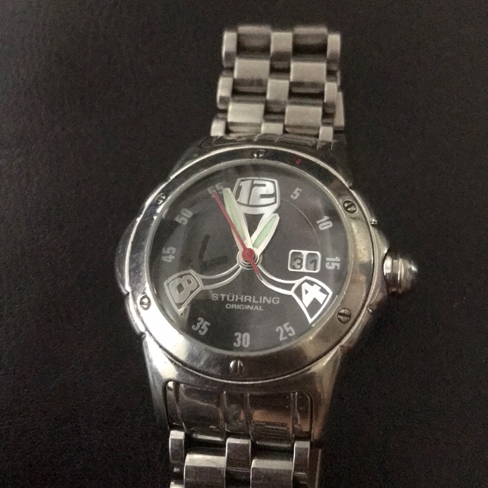 Stuhrling women’s silver watch with new battery.
